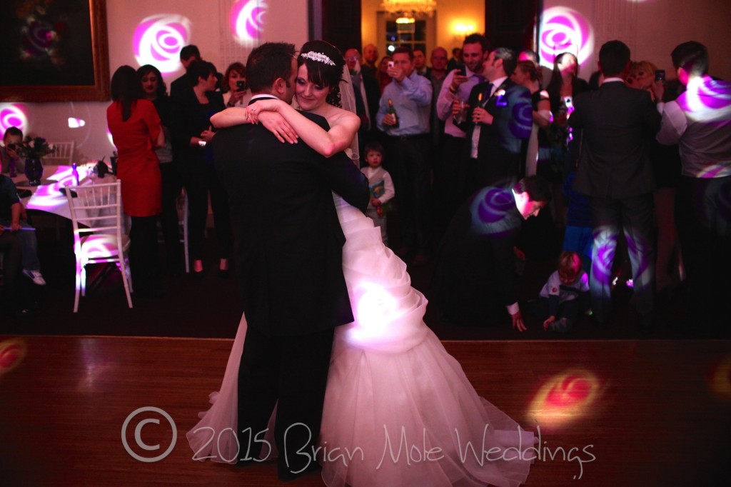 Bride and Groom enjoying their first dance in the ballroom at Buxted
