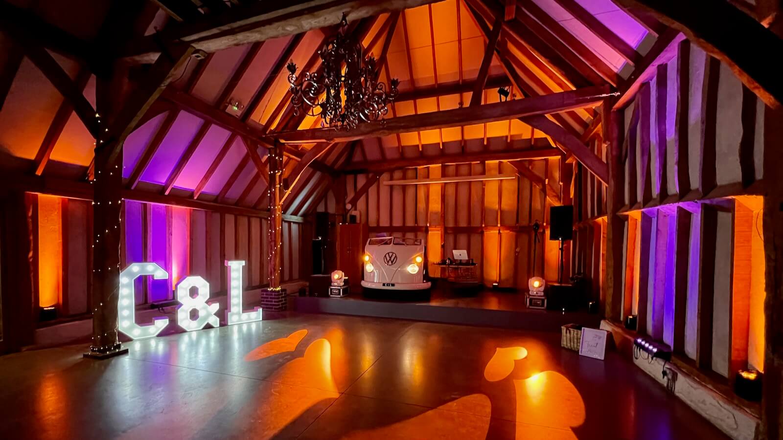 Brian Mole wedding DJ with VW DJ booth, working alongside a singer at Southend Barns