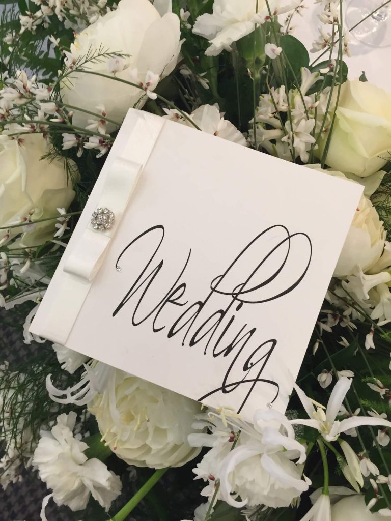 wedding card and flowers