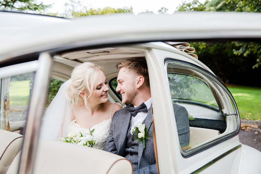 Molly and Will, just married, captured by Emma Russell Photography