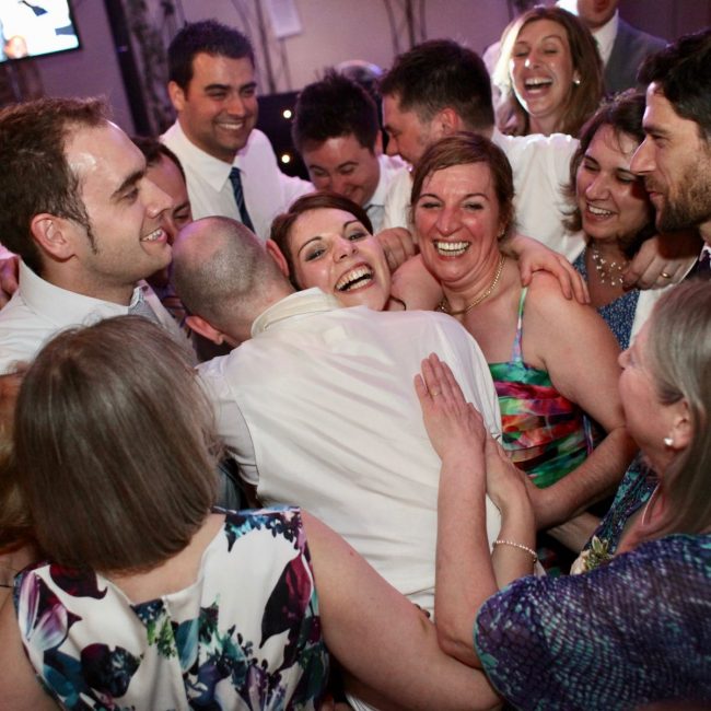 group hug with the bride and groom!