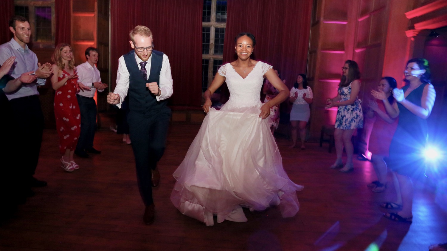 newlyweds dancing with their guests at Balcombe Place