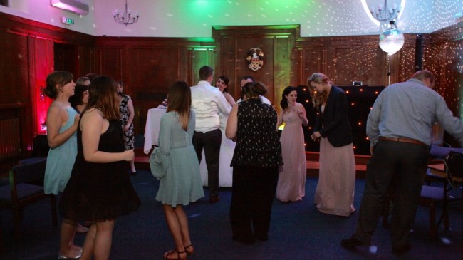 Friends and family dancing at the wedding disco