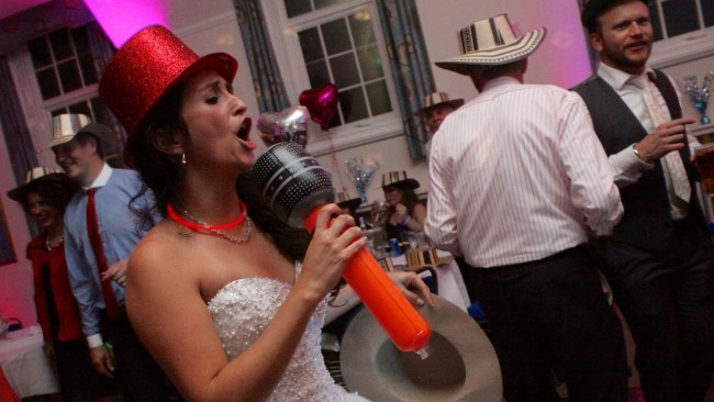 bride with inflatable microphone