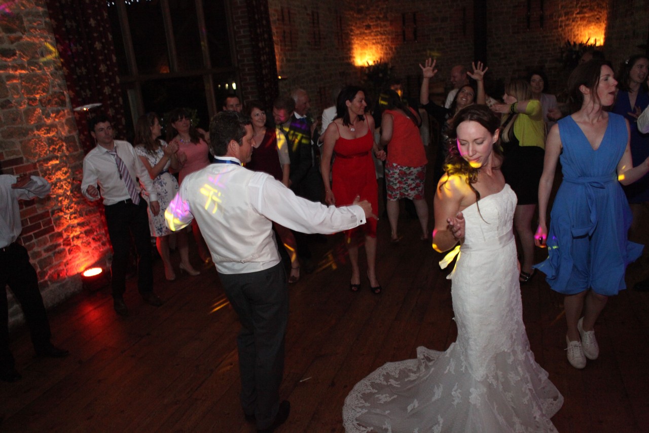 bride and groom dancing in the Barn