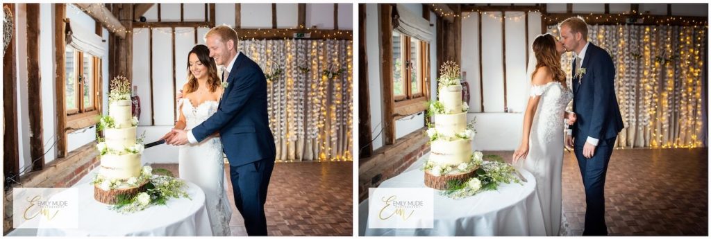 Bride and groom cutting the cake at Fitzleroi Barn