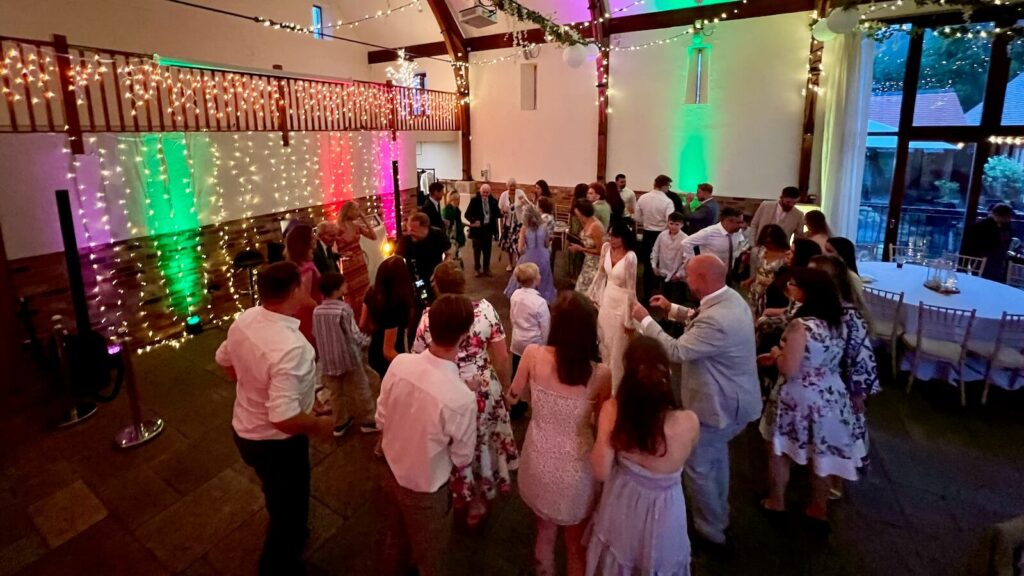 Long Furlong Barn Wedding Ana Helena and Jack dancing with all their guests