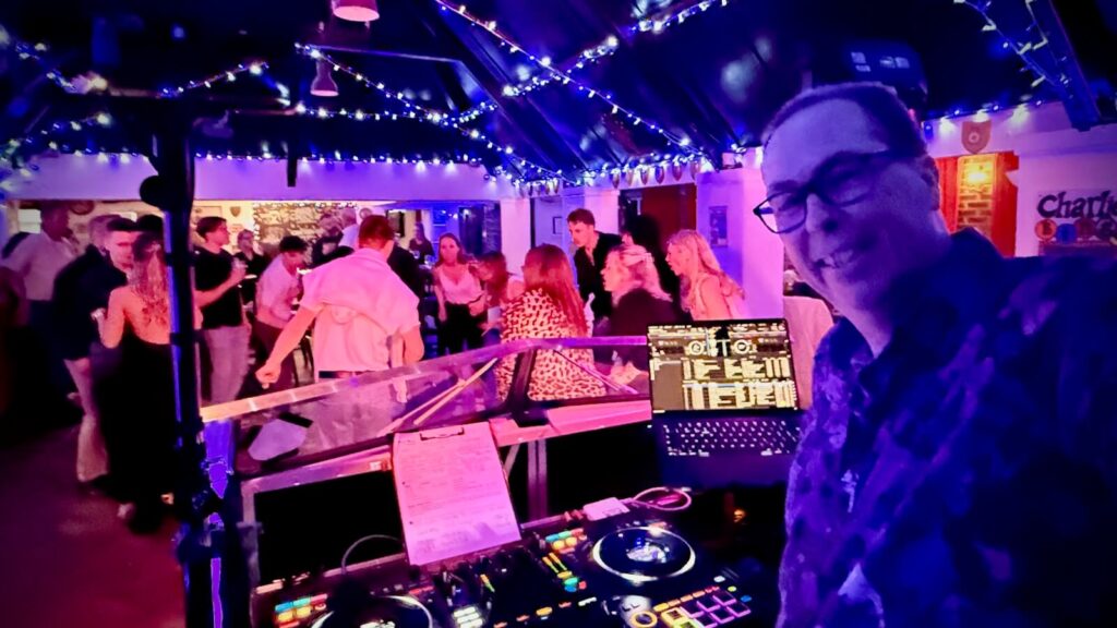 Everyone dancing at Robin's 40th birthday party at Limpsfield Royal British Legion Club with DJ Brian Mole and the awesome VW DJ booth