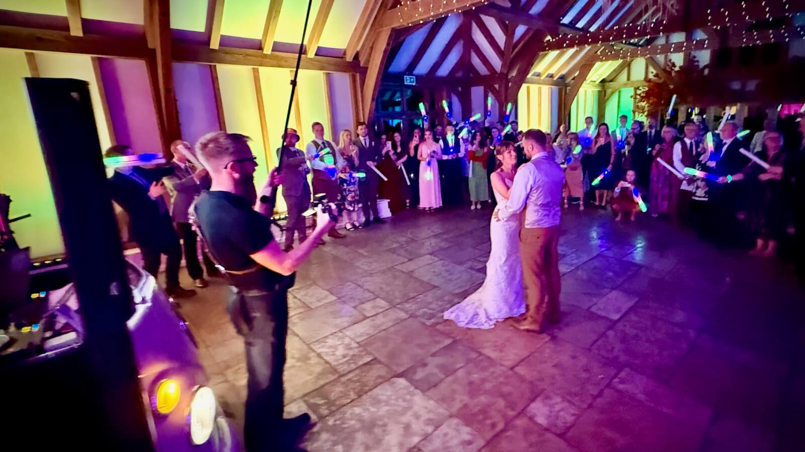 Alex and Jo’s first dance mashup at Brookfield Barn, with vw DJ booth in the background