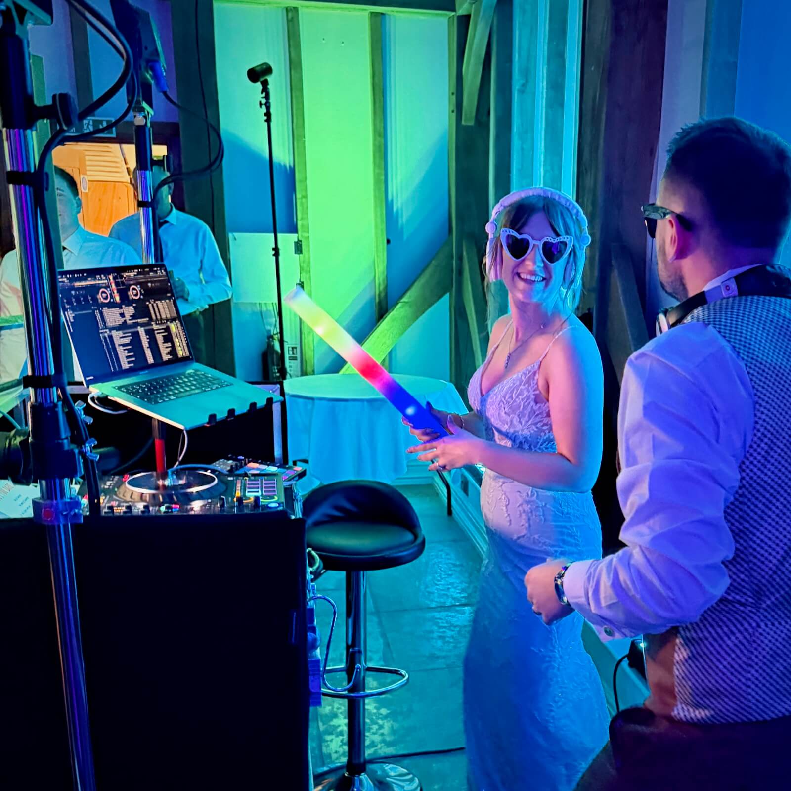 Guests dancing during Alex and Jo’s DJ battle at Brookfield Barn in West Sussex