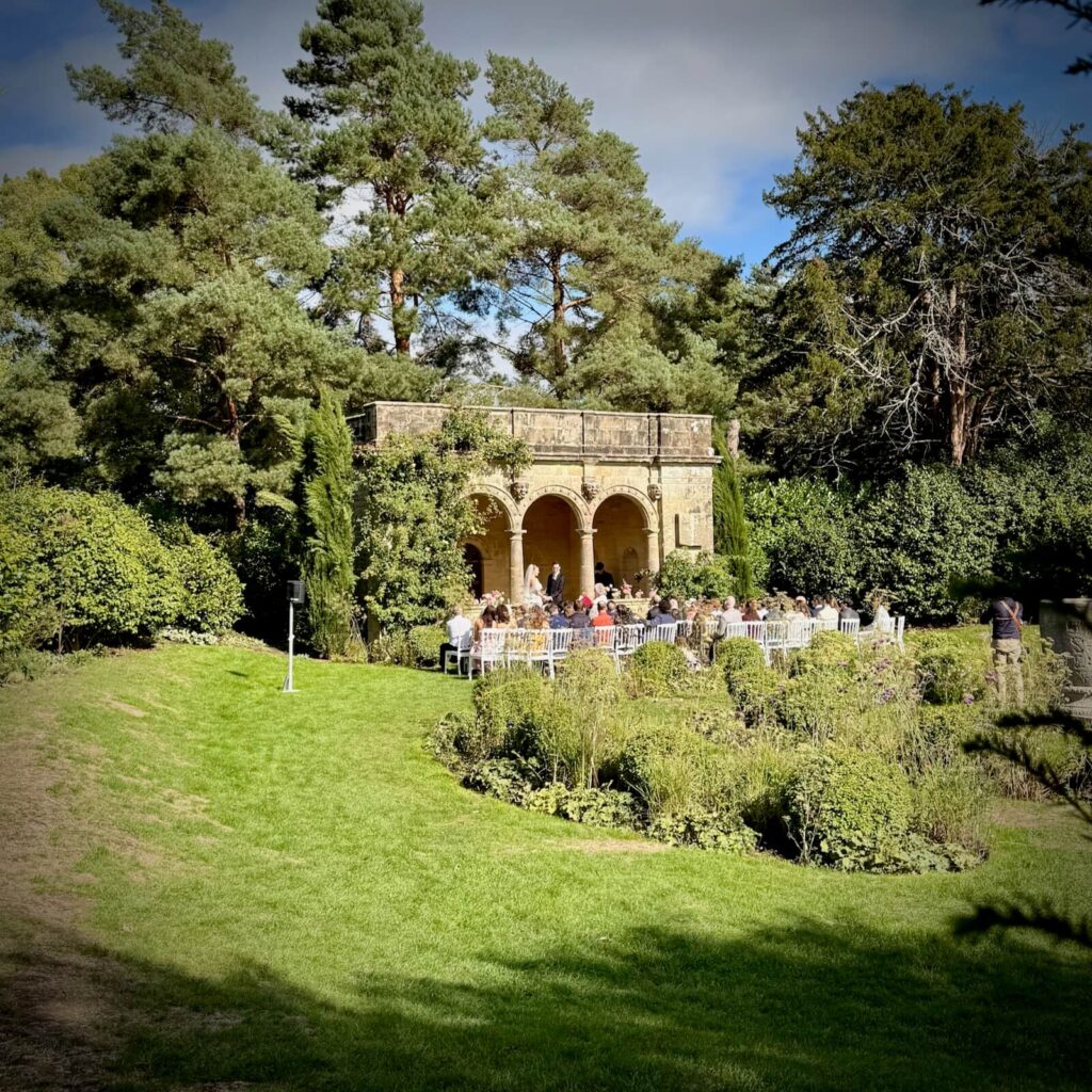 Charlotte and Alex's wedding ceremony in the Loggia at Nymans with DJ Brian Mole
