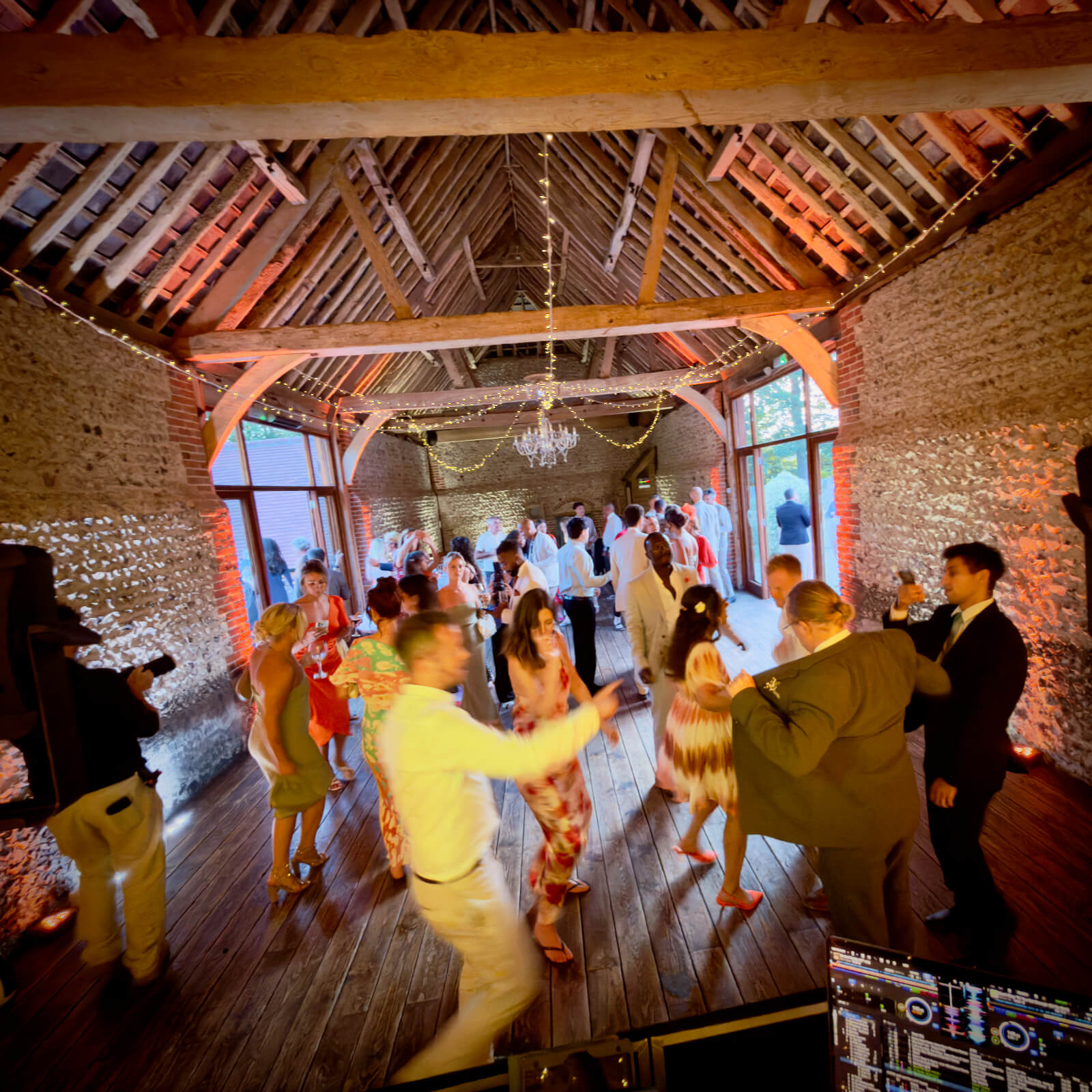 fern and josh's wedding at cissbury barns, dj brian mole spinning the tunes, dance floor busy