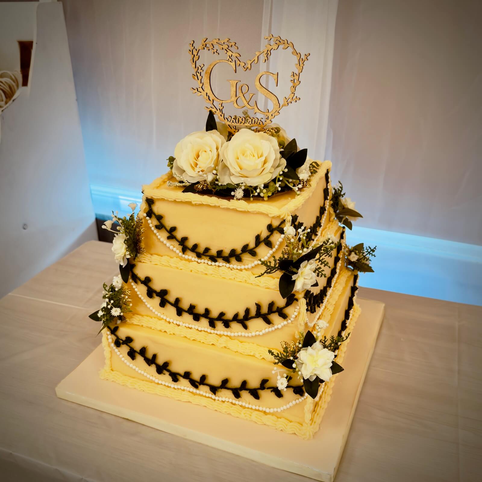 Gail and Simon's wedding cake for their wedding at Bramshaw Village Hall in the New Forest, 26th September 2026 with DJ Brian Mole and the VW DJ booth