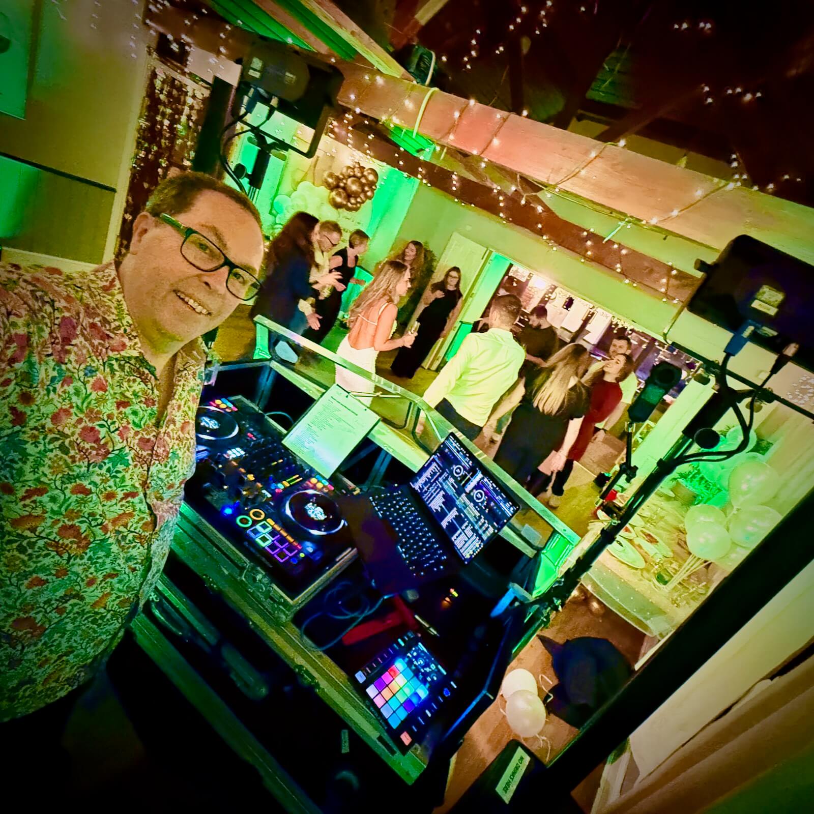 Leah, and Michael dancing with their friends and family for their engagement party at the Shelley Arms, Broadbridge Heath, with DJ Brian Mole